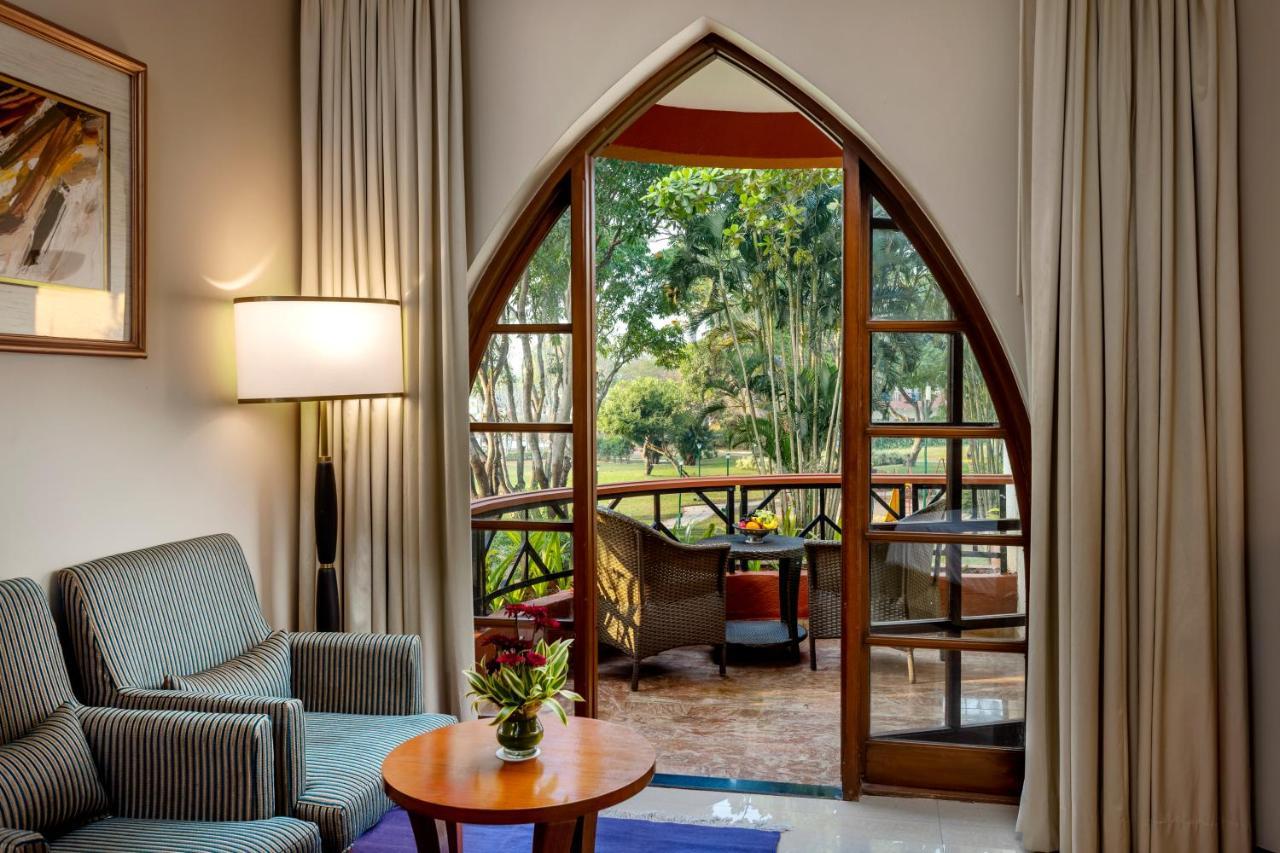 Caravela Beach Resort Varca Kültér fotó A room at the hotel