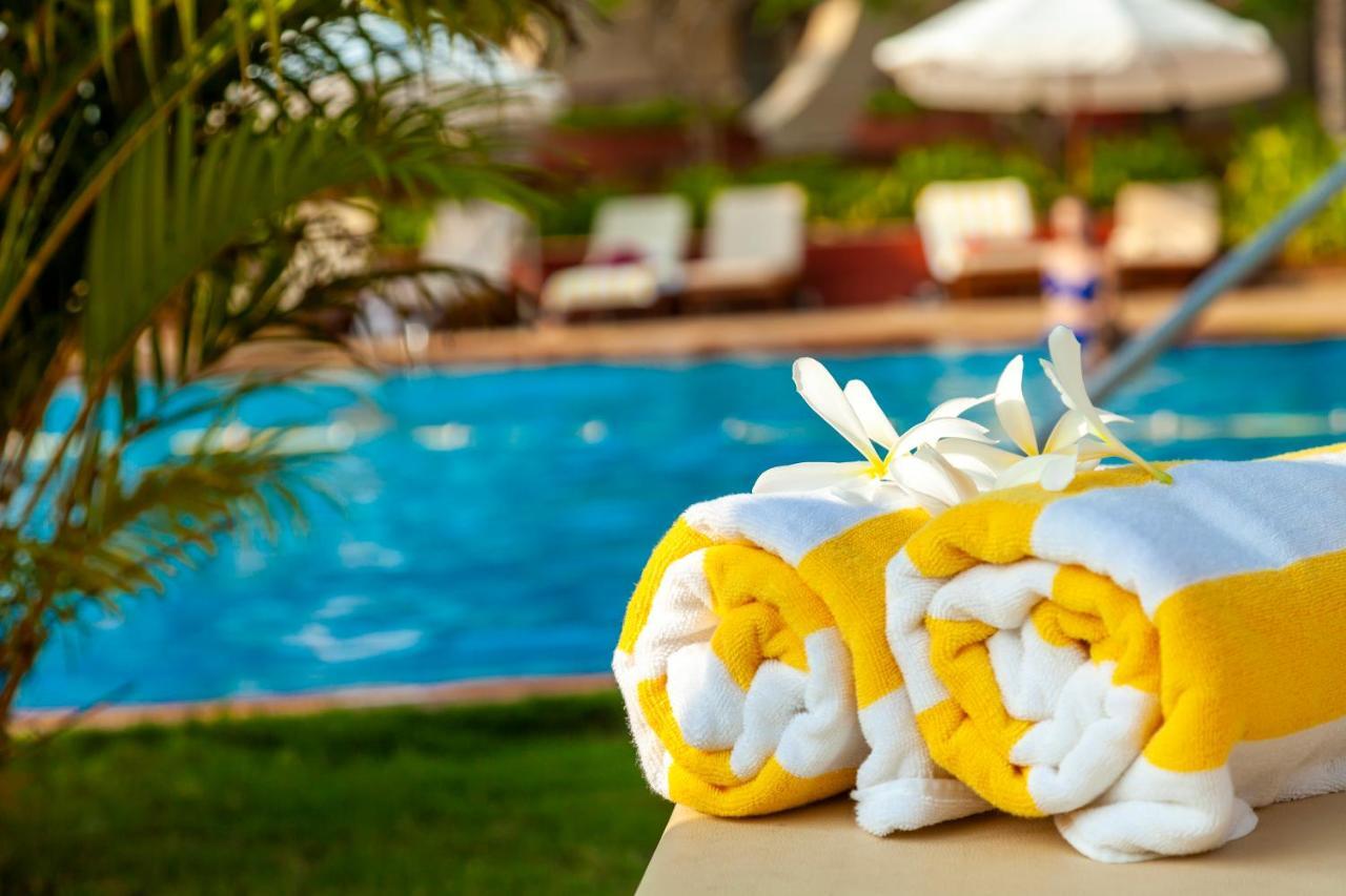 Caravela Beach Resort Varca Kültér fotó Pool towels